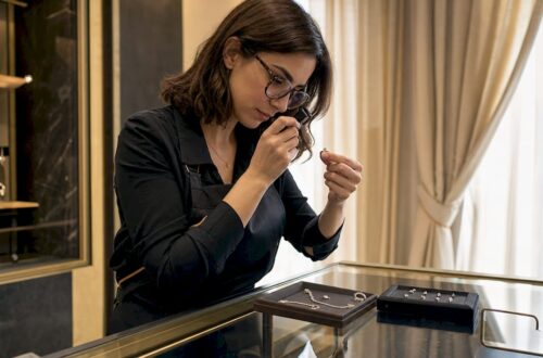Jeweler examining an E color diamond closely