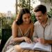 Couple reviewing custom wedding ring designs