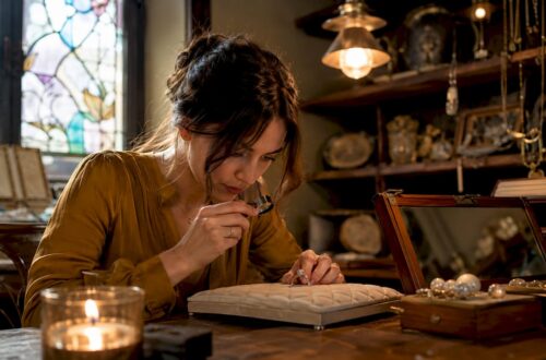 Woman inspecting vintage engagement ring