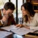Couple reviewing engagement ring designs