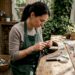 Artisan crafting handcrafted children's ring at workshop