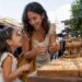 Mother and daughter shopping for gold jewelry