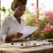 Artisan jeweler reviewing ethical gemstone documents