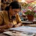 Jeweler verifying diamond with certification report