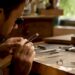 Jeweler inspecting heirloom diamond closely