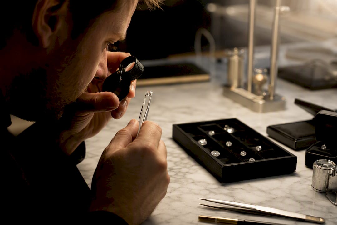 Jeweler examining diamond clarity close-up