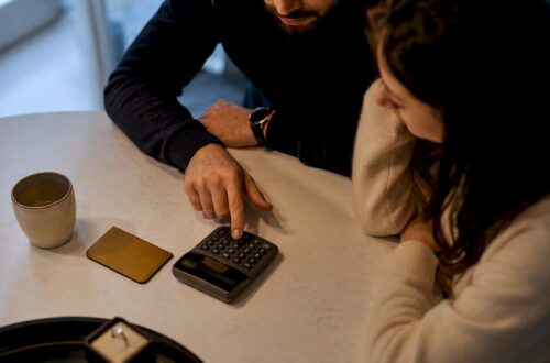 Couple reviewing ring financing costs