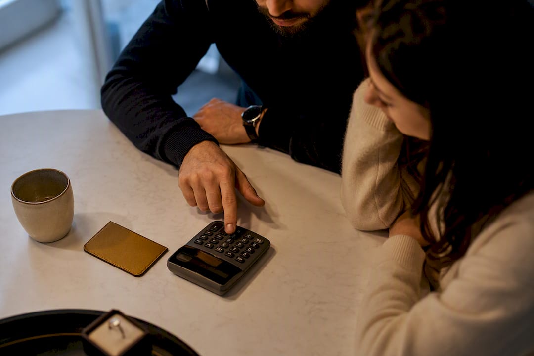Couple reviewing ring financing costs