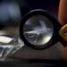 Diamond girdle viewed through a jeweler’s loupe