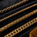Cropped gold chain link styles on velvet