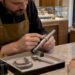 Bar-set diamond ring beside sizing tools