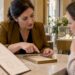 Buyer reviewing diamond report with jeweler
