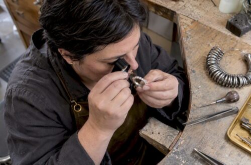 Jeweler inspecting a full eternity band
