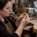 Jeweler comparing gold platinum and tungsten rings