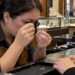 Jeweler inspecting a diamond ring for trade-in
