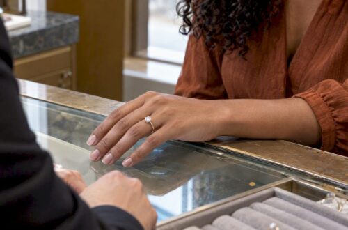 Solitaire diamond ring on a petite hand