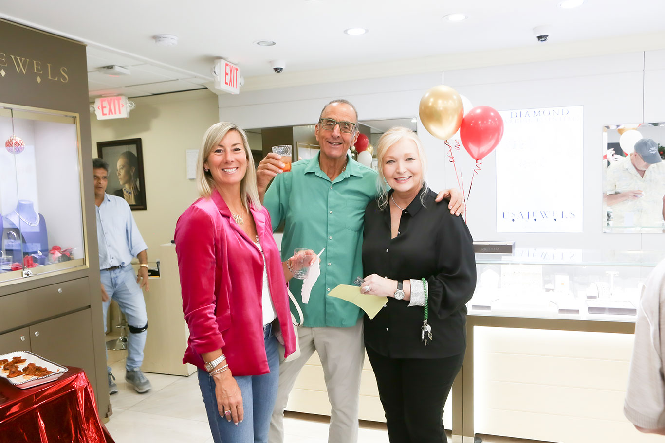USA Jewels team and customers celebrating at our holiday open house