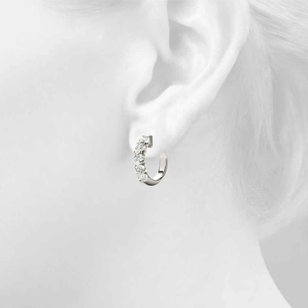 Channel Set Huggie Earrings 1/4 Carat Total Weight