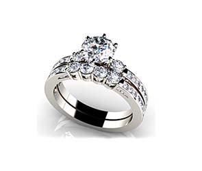Three Across plus Side Stone Engagement Ring